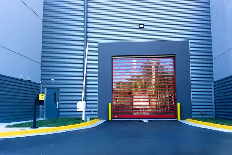 Modern self storage building with secure indoor loading entrance